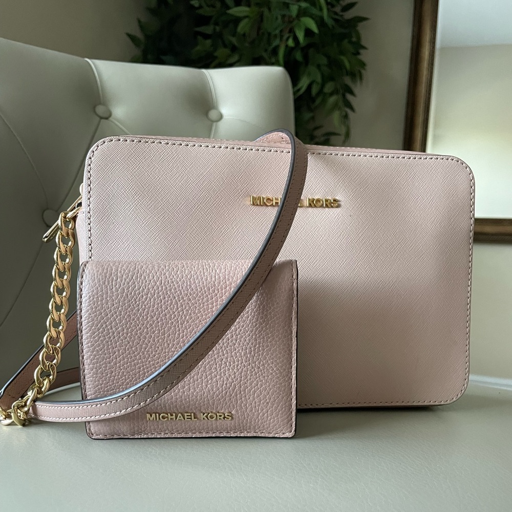 Two-toned Michael Kors crossbody bag with matching wallet.